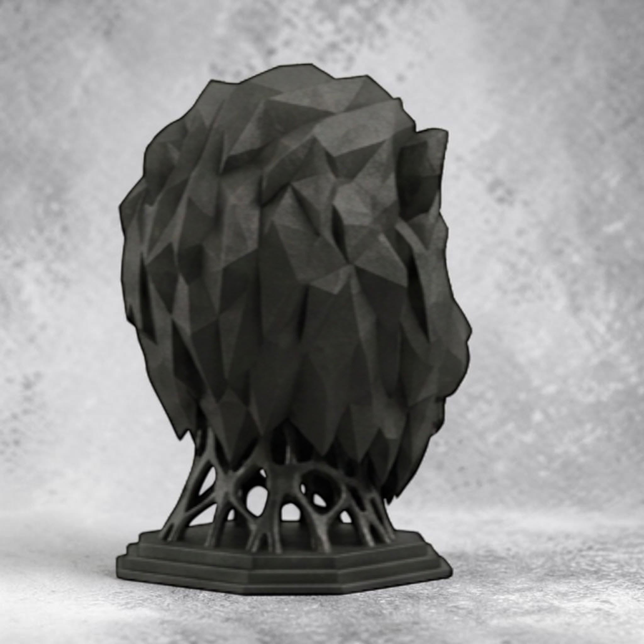 Happy3dWorld matte black geometric lion head headphone stand with a polygon design for minimalist desk organization.