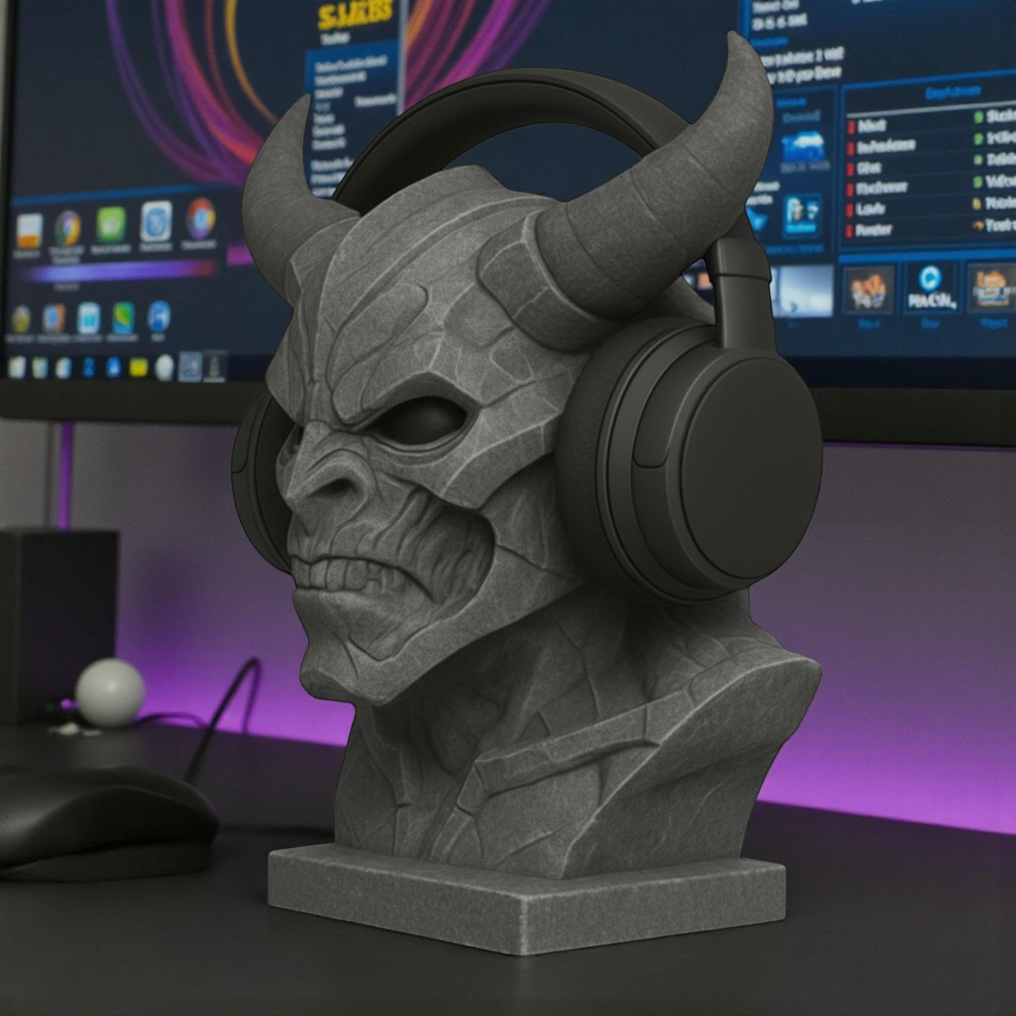 Happy3dWorld matte gray 3D printed cyber demon bust headphone stand holding black over-ear gaming headset on a desk