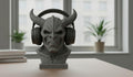 Happy3dWorld matte gray 3D printed cyberpunk demon bust headphone stand holding black gaming headset on a desk