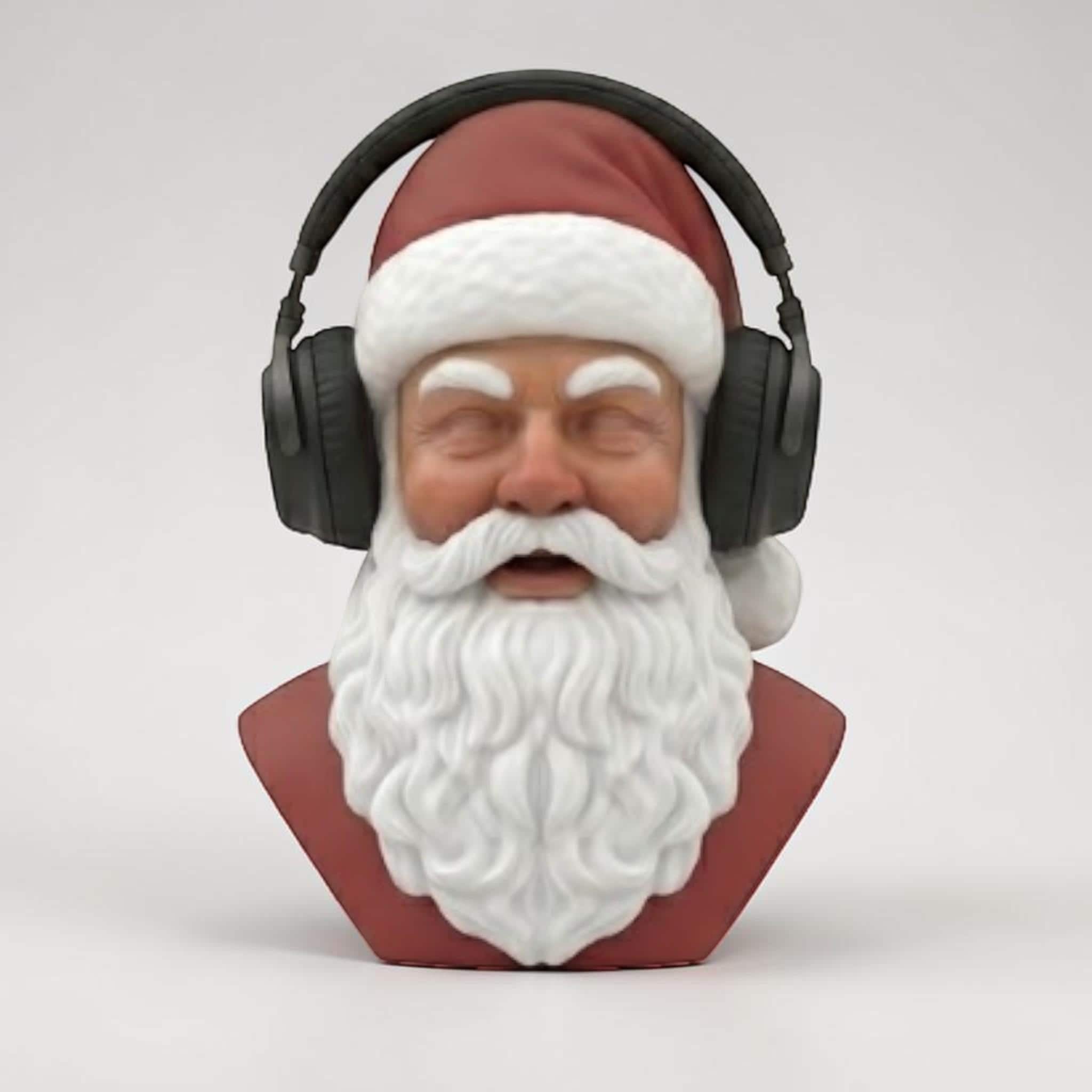 Happy3dWorld 3D printed Santa Claus bust wearing black over-ear headphones, a festive red and white desk decoration.
