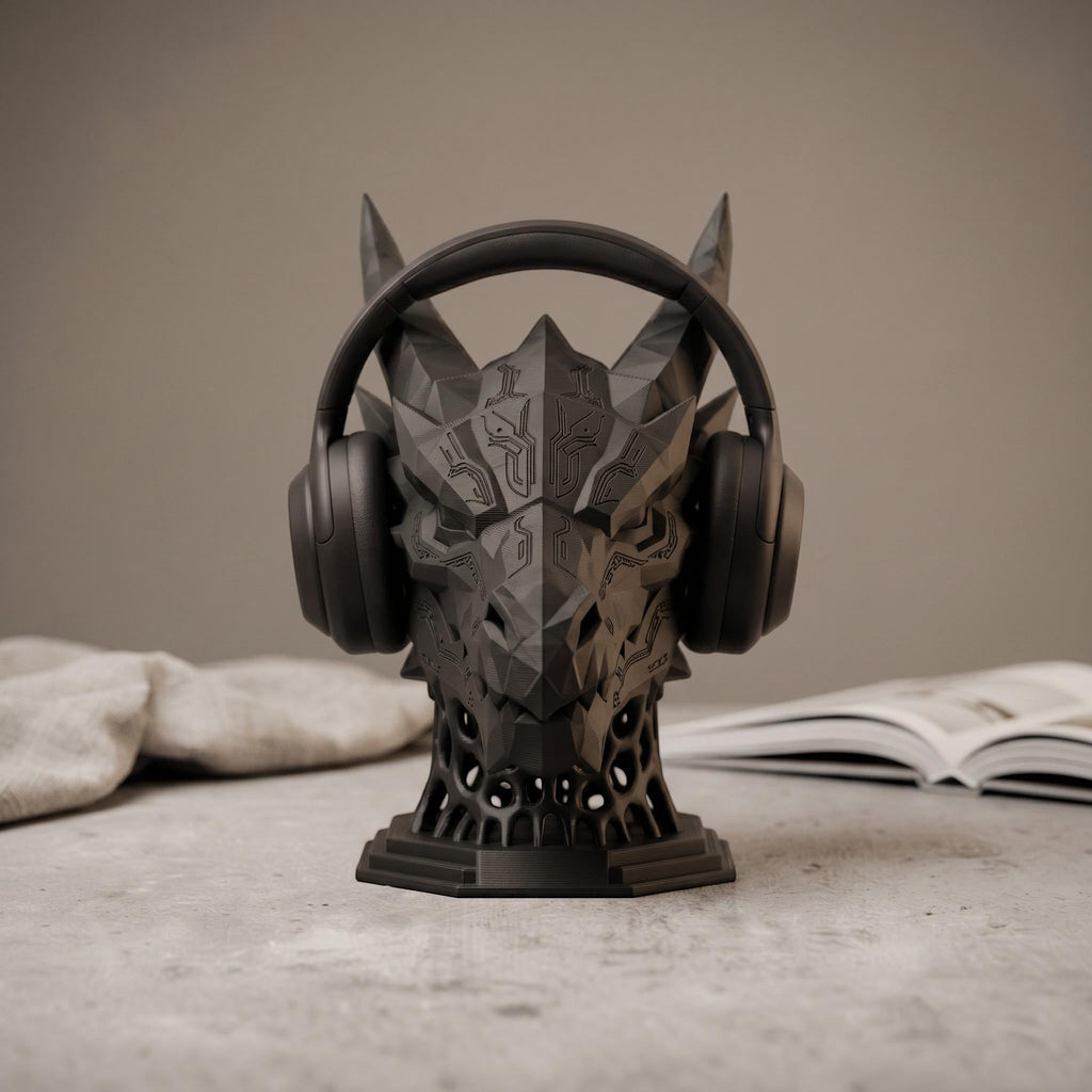 Happy3dWorld matte black 3D printed dragon headset stand with geometric cyber-mech design holding gaming headphones.