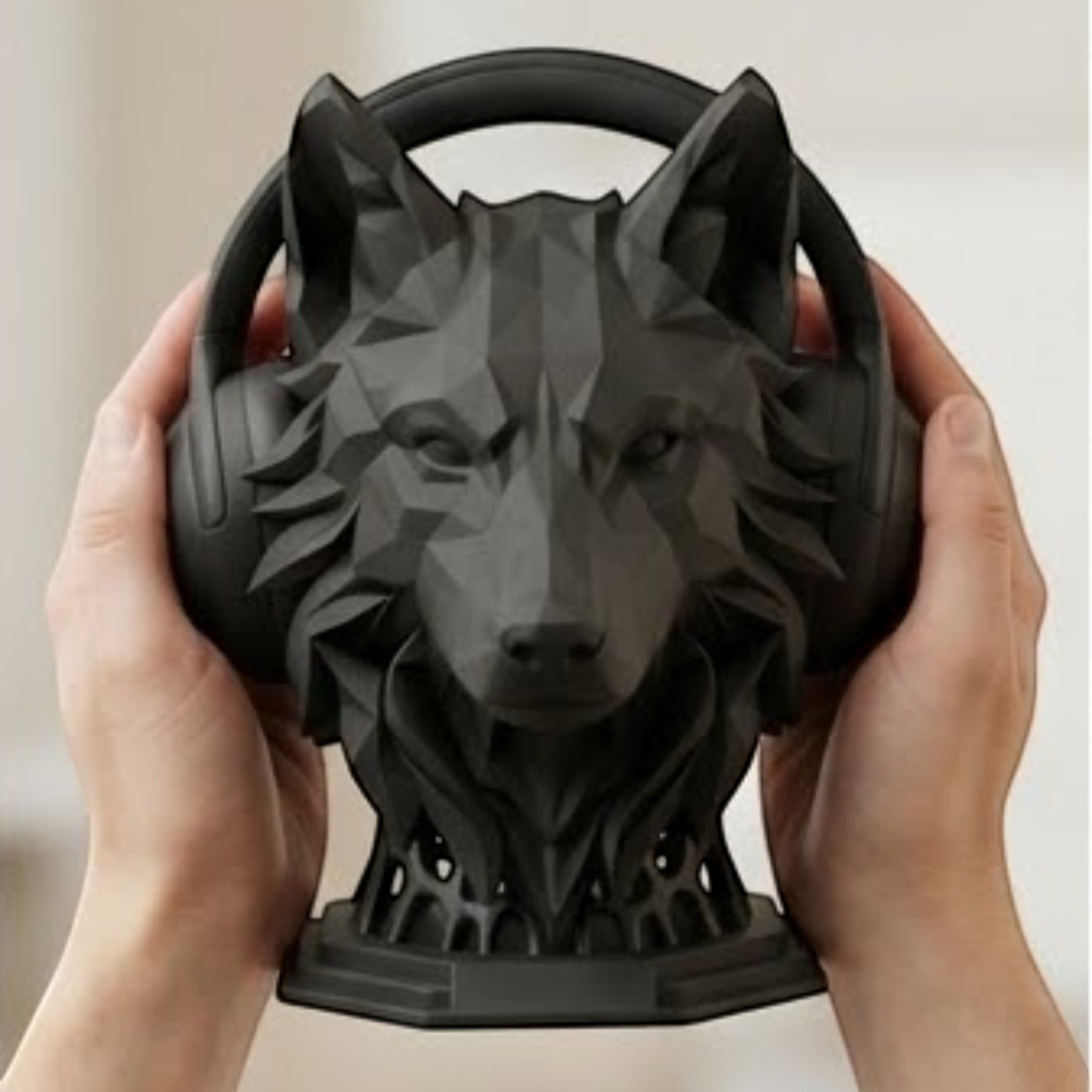 Happy3dWorld matte black geometric wolf head headphone stand held by hands
