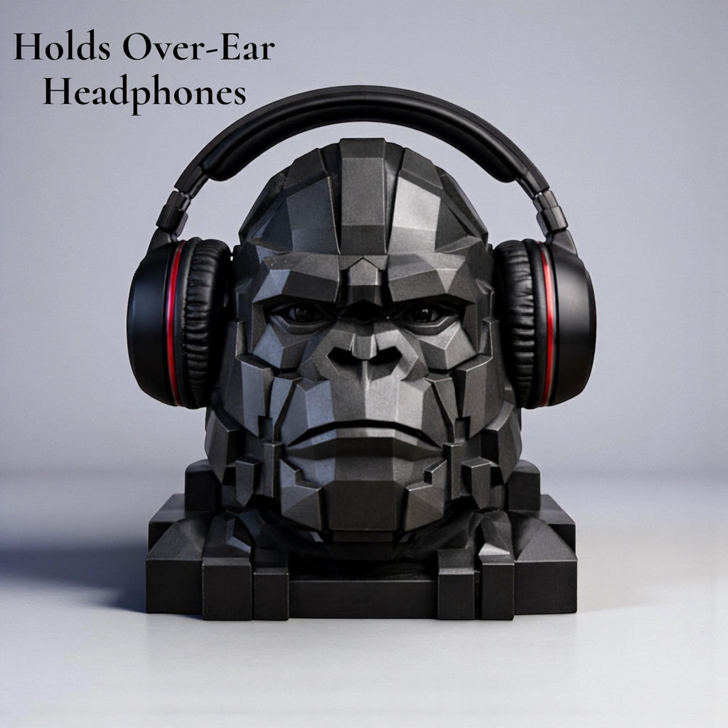 Happy3dWorld black geometric gorilla headphone stand holding over-ear gaming headset on a desk