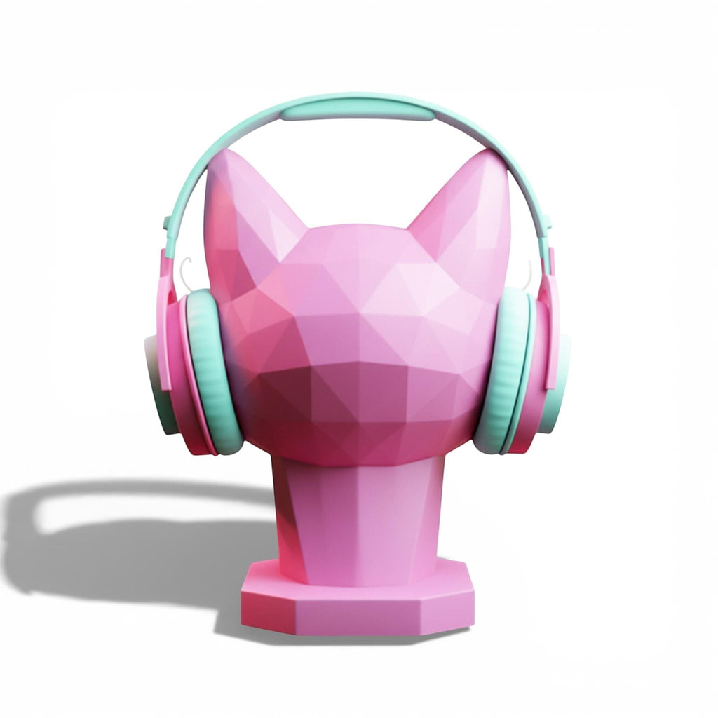 Happy3dWorld pink low-poly geometric cat headphone stand holding pastel blue and pink over-ear headphones.
