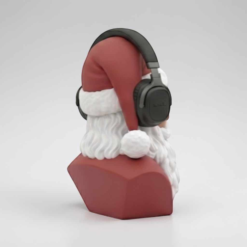 Happy3dWorld 3D-printed Santa bust wearing black over-ear headphones, featuring red hat and white beard desk decor.