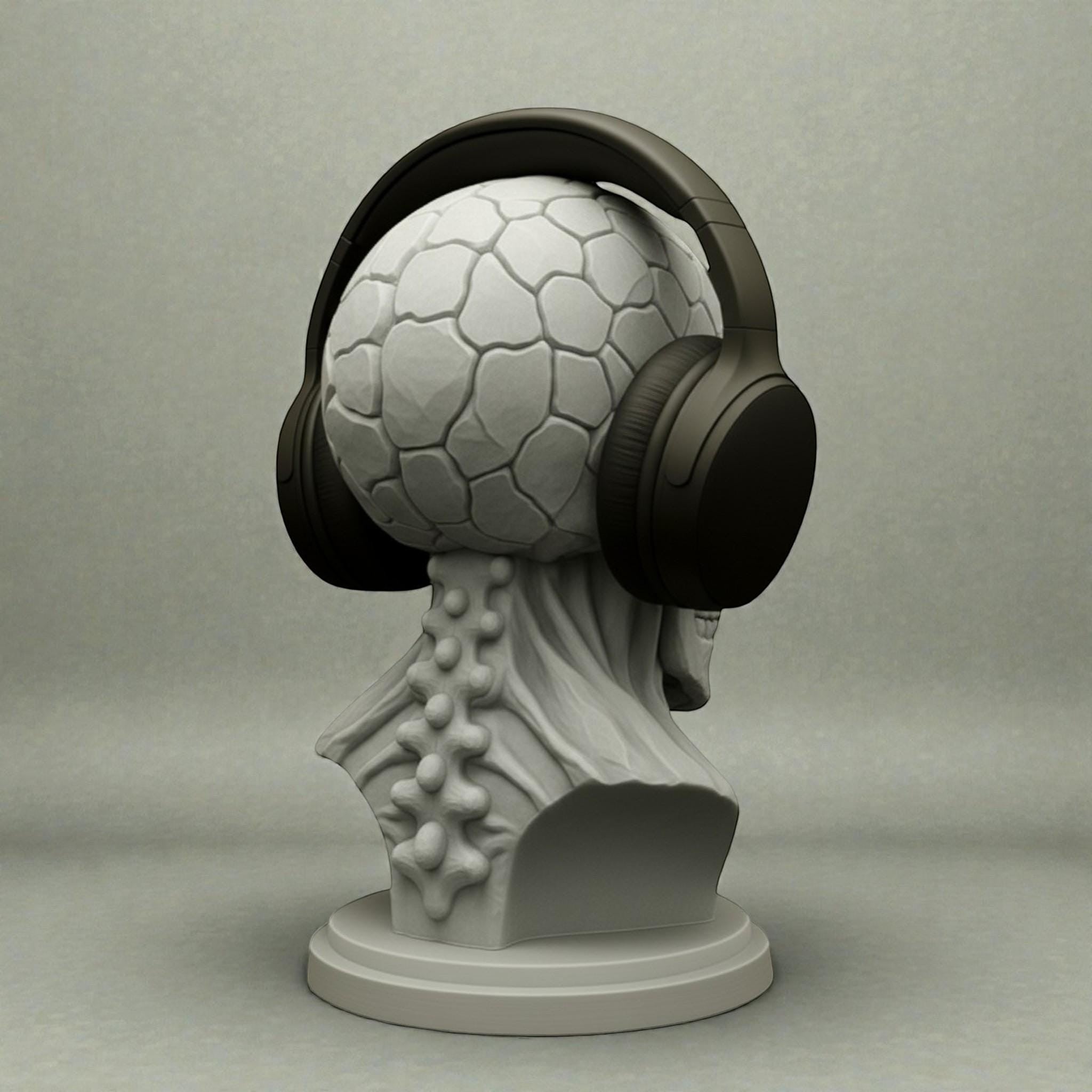 Happy3dWorld cyberpunk skull headphone stand with a textured brain design holding black over-ear gaming headphones.